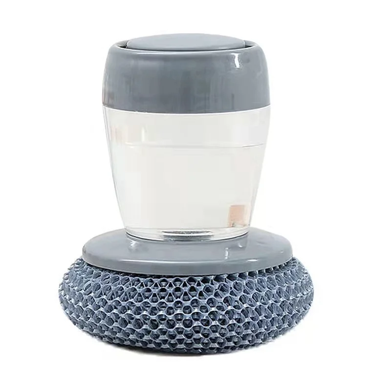Brush with soap dispenser